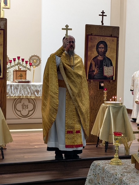 Father John giving the final blessing